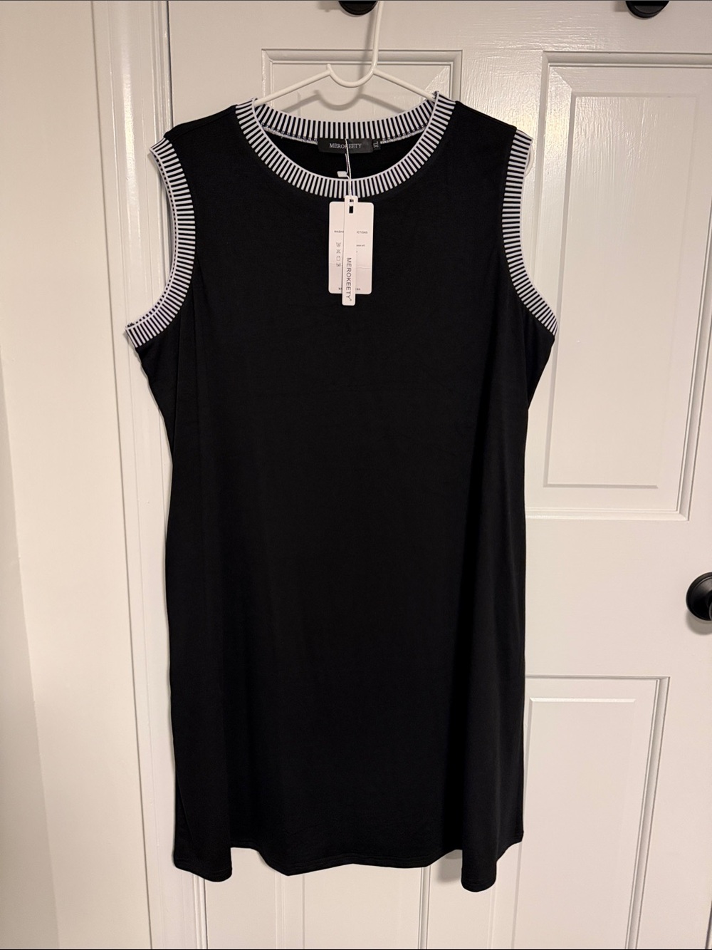 Black Sleeveless Mini Dress with Striped Trim Detail